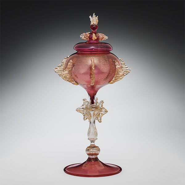 covered chalice in rose and gold glass with ornamentation