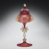 covered chalice in rose and gold glass with ornamentation